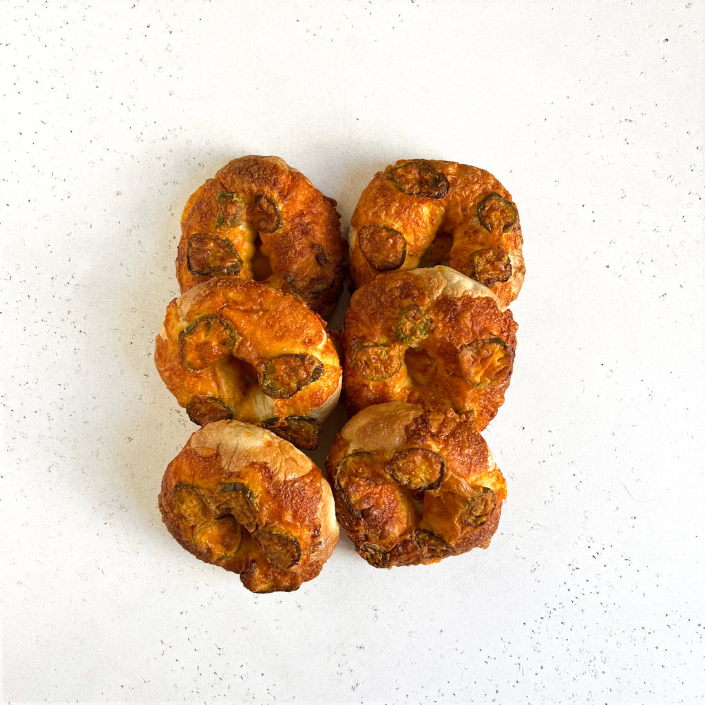 Get the Best Tasting Jalapeño Cheddar Bagels with Crieve Hall Bagel Co and Hot Poppy Delivery